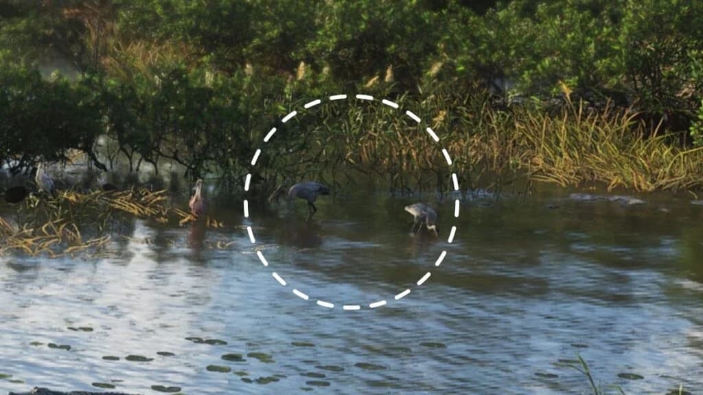 A blue heron standing in shallow water waiting for fish in GTA 6